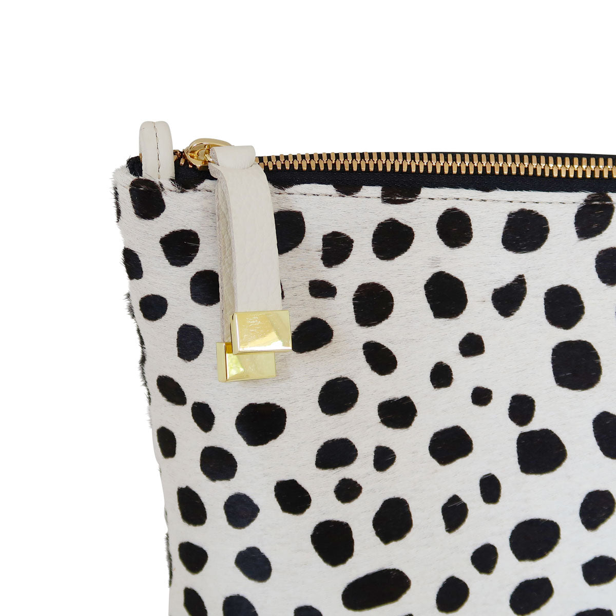 Sold Dotty- Real leather clutch. Hair on hide clutch